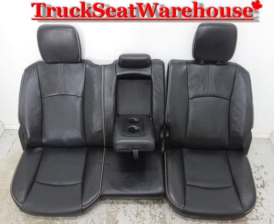 Black Leather rear 60/40 bench seat from a 2014 Dodge Ram Laramie Limited Edition Crew Cab Truck .