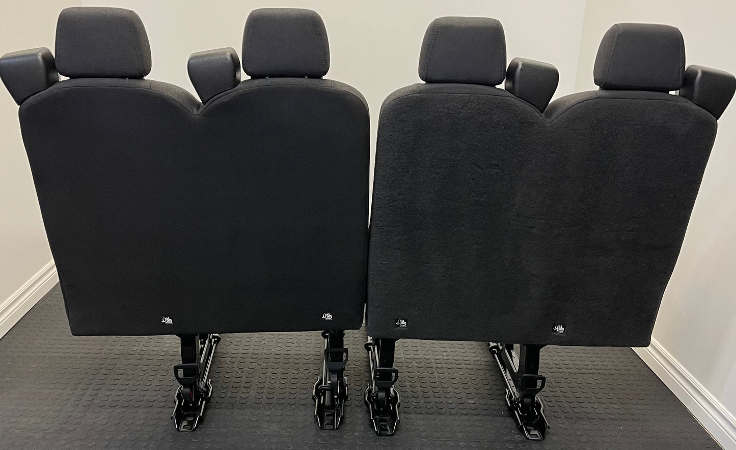 Ford Transit Passenger Van Black Cloth Quick Release Universal Fit 4 Position Bench Seat 64" Wide Including the Seatbelt Retractor.