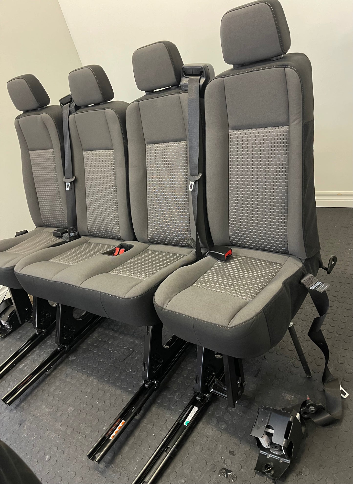 Ford Transit Passenger Van Dark Palazzo Grey Cloth Quick Release Universal Fit 4 Position Bench Seat 64" Wide Including the Seatbelt Retractor.