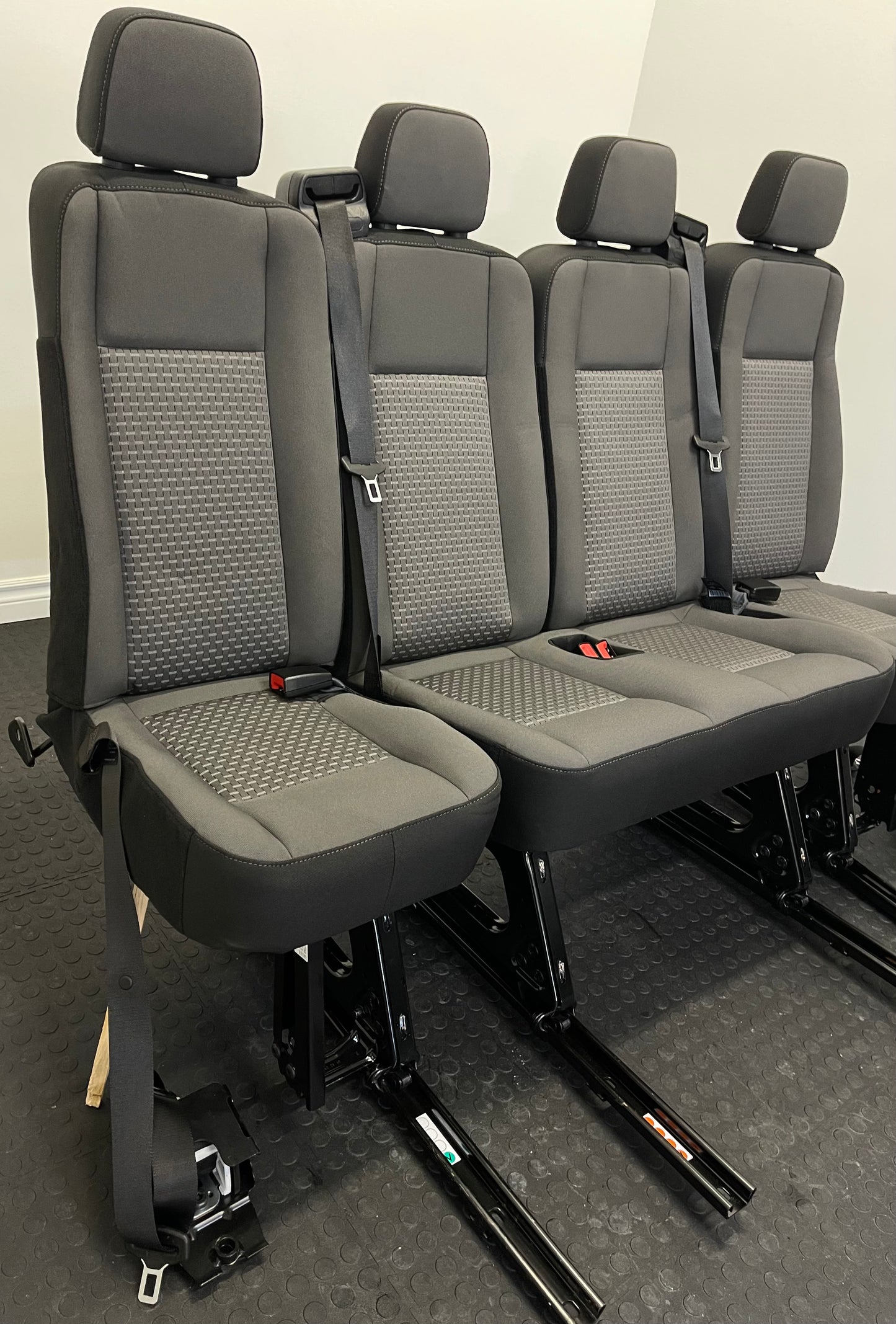 Ford Transit Passenger Van Dark Palazzo Grey Cloth Quick Release Universal Fit 4 Position Bench Seat 64" Wide Including the Seatbelt Retractor.