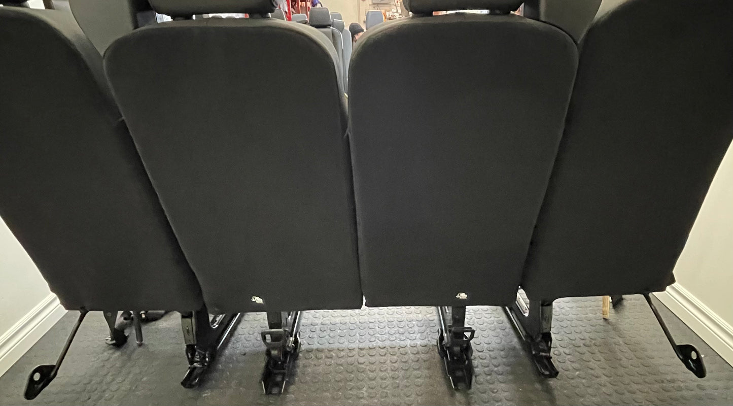 Ford Transit Passenger Van Dark Palazzo Grey Cloth Quick Release Universal Fit 4 Position Bench Seat 64" Wide Including the Seatbelt Retractor.