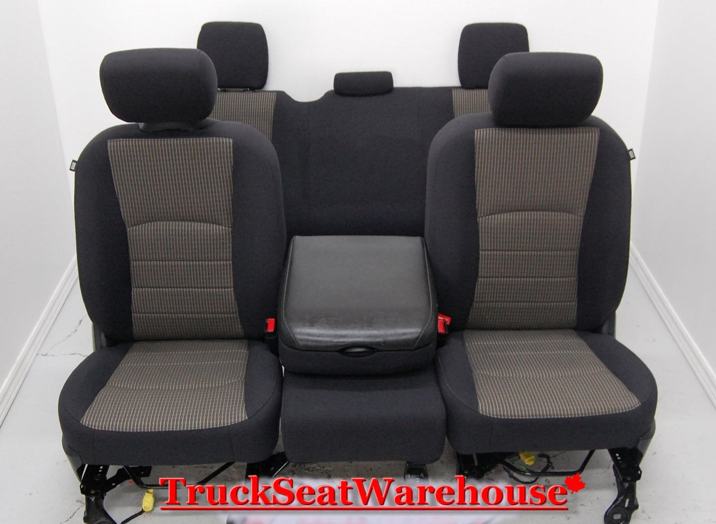 Black and Tan cloth front and rear seats and center console from a 2012 Dodge Ram Quad cab Truck .