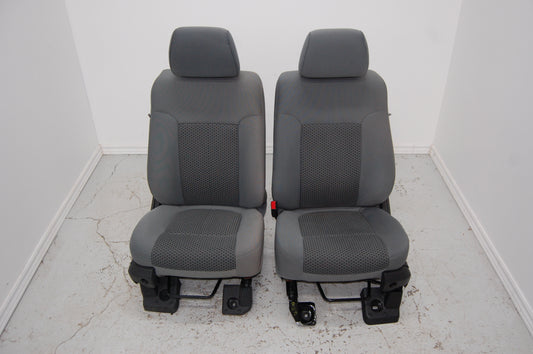 Grey cloth manual front seats from a 2011 Ford F250 Superduty Truck . F350 F450 F550 2009 2010 2011 2012 2013 2014
