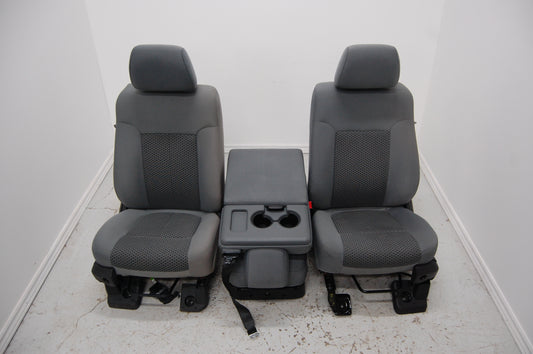 Grey cloth manual front seats and fold down seat console from a 2012 Ford F250 Superduty Truck F350 F450 F550 2009 2010 2011 2012 2013 2014