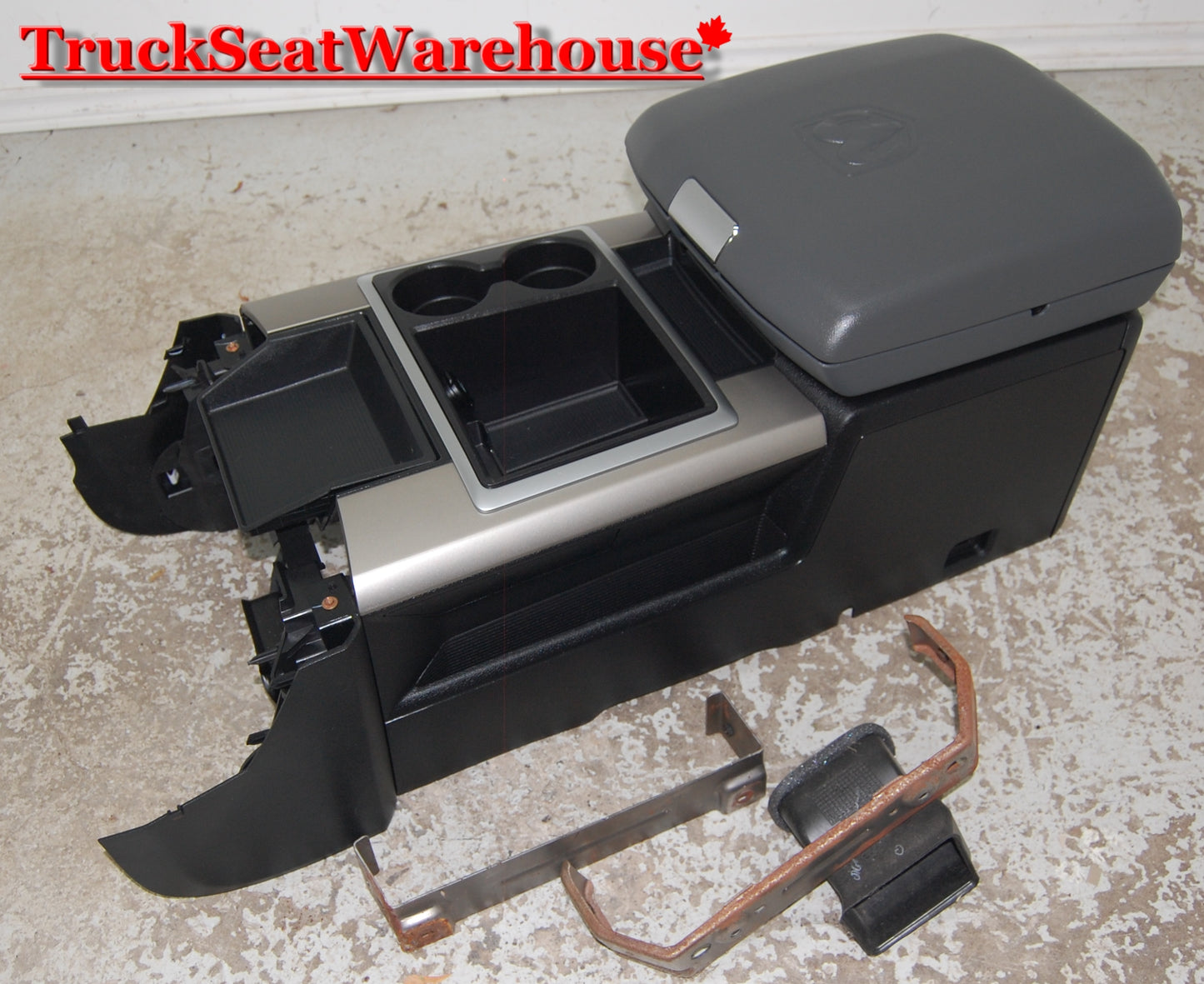 Front center console kit from a 2015 Dodge Ram Truck. Gray lid .