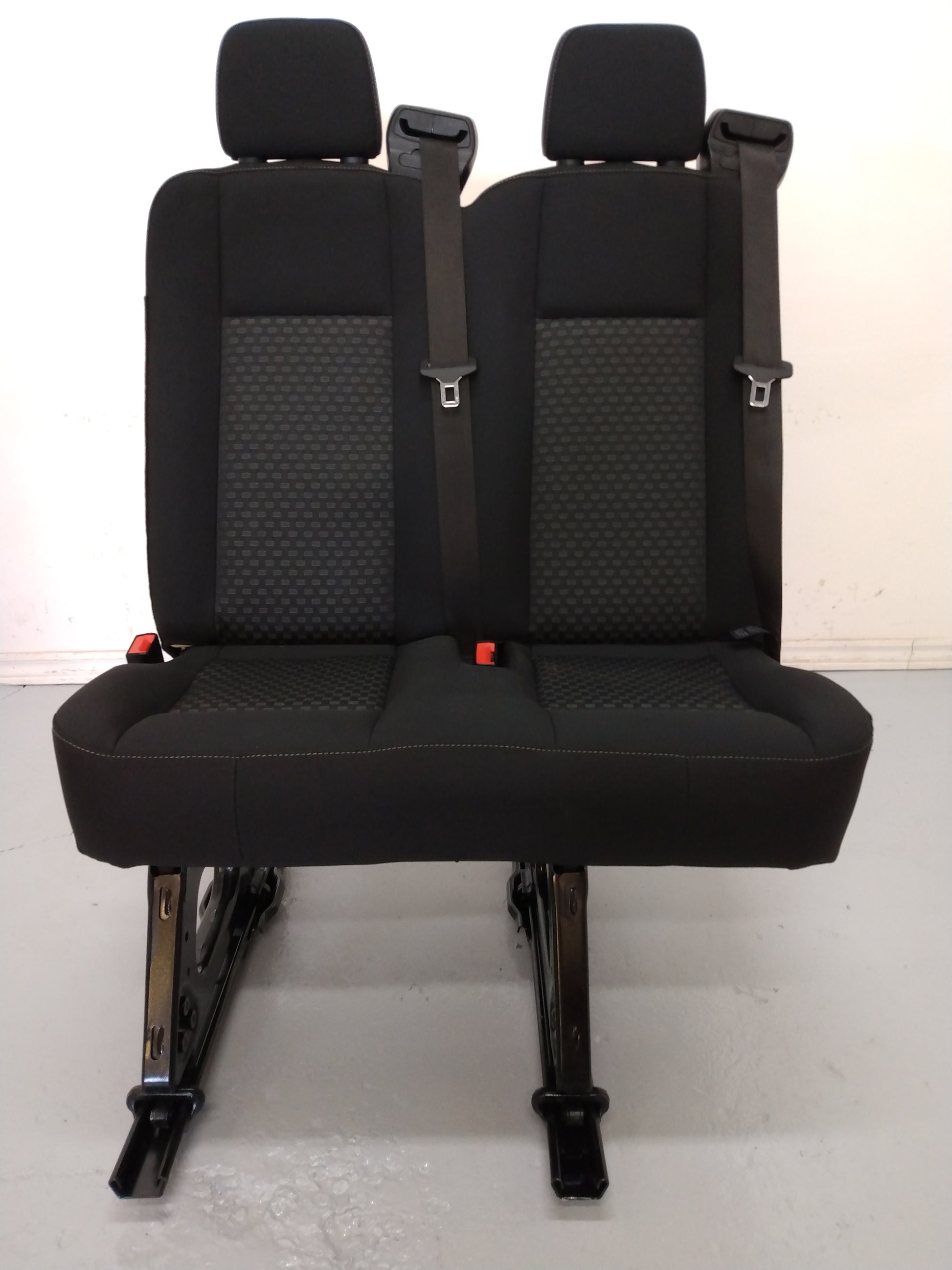Black cloth 31" wide left side two position bench seat with integrated seatbelt new take out from 2020 Ford Transit vans. removable quick release universal fit perfect for custom install in camper cargo work van, promaster 